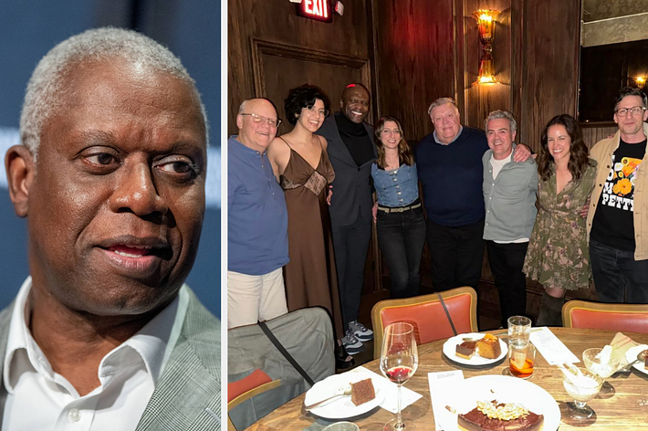 Group of people smiling around a dinner table, including a man in a basketball jersey