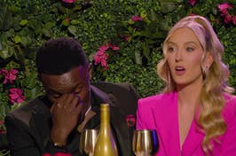 Kwame and Chelsea from Love Is Blind sit at a dinner table