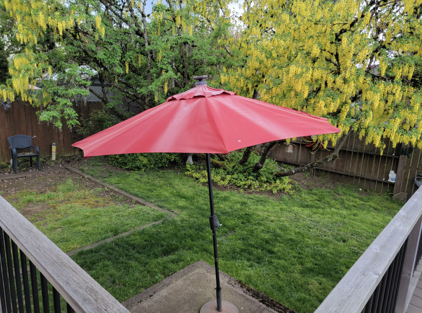 Patio umbrella standing in a backyard
