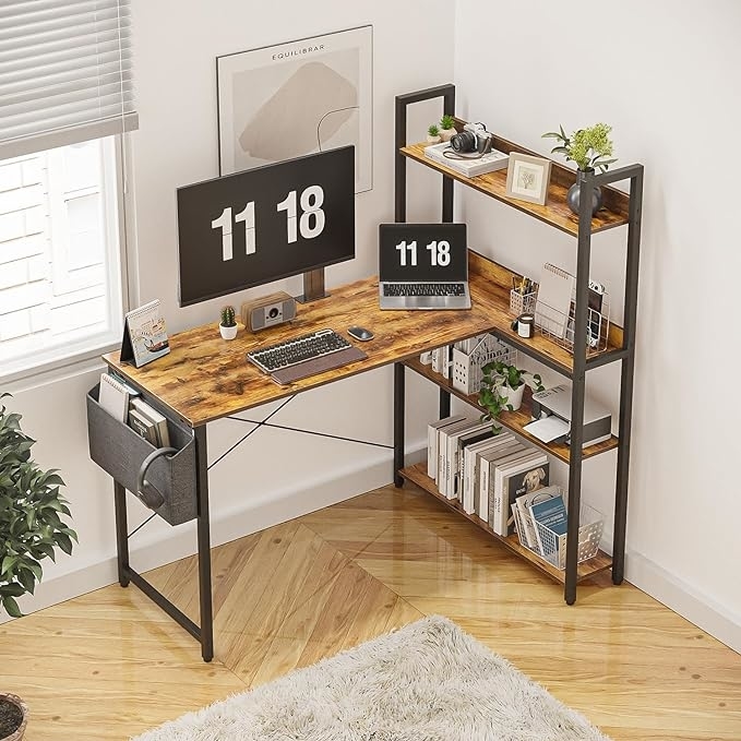 A modern home office setup with a wooden desk, shelving unit, and decorative items
