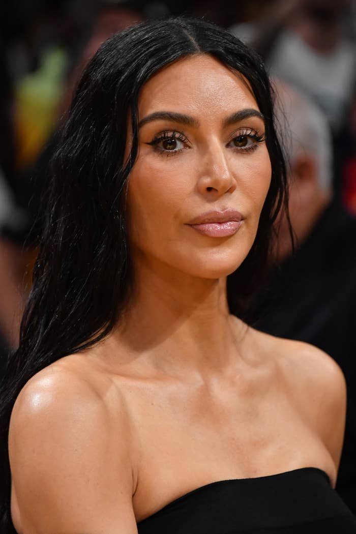Kim Kardashian in a strapless outfit at an event