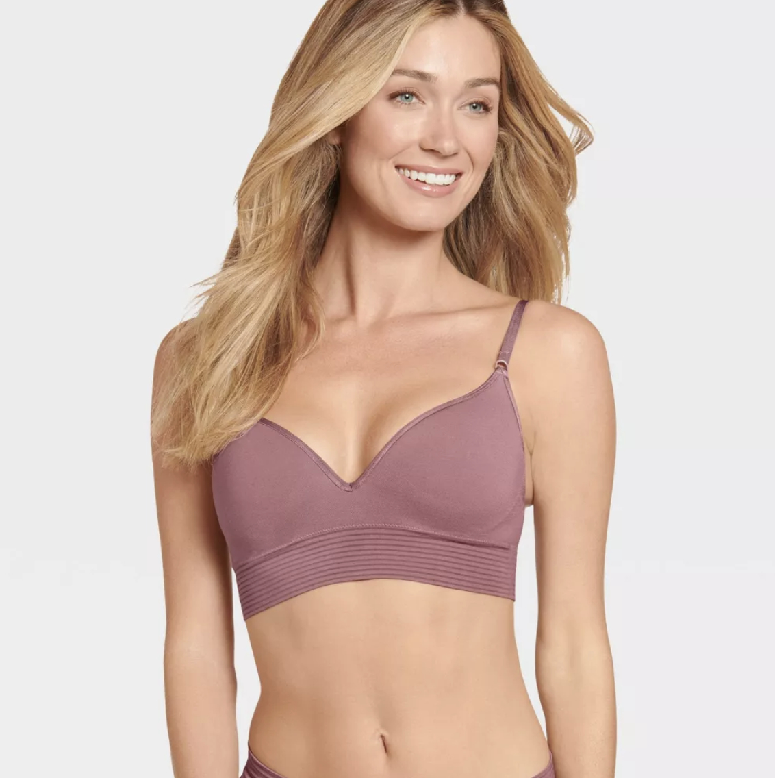 model wearing a simple, seamless bralette for a comfortable fit