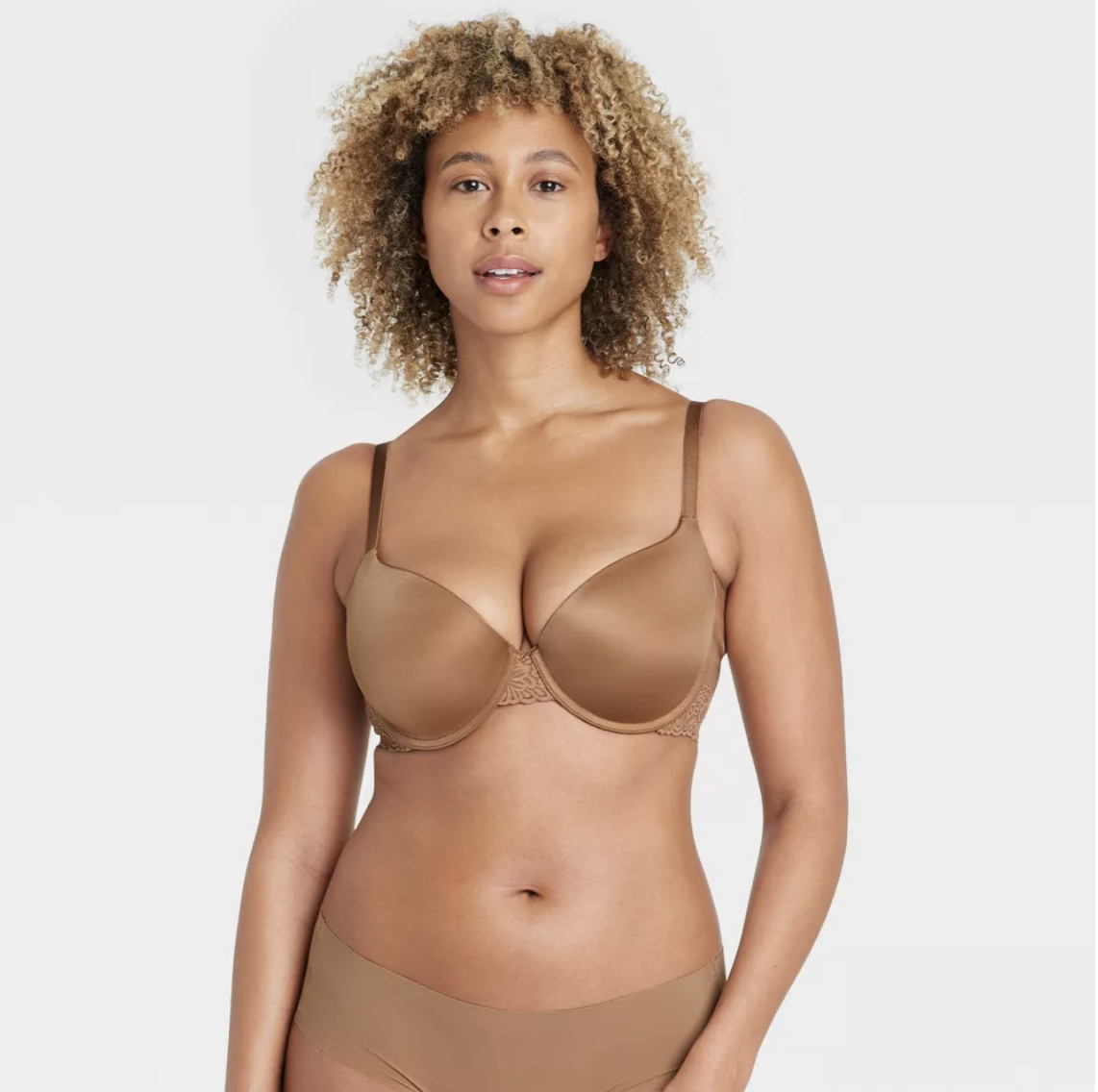model wearing a light brown push up bra