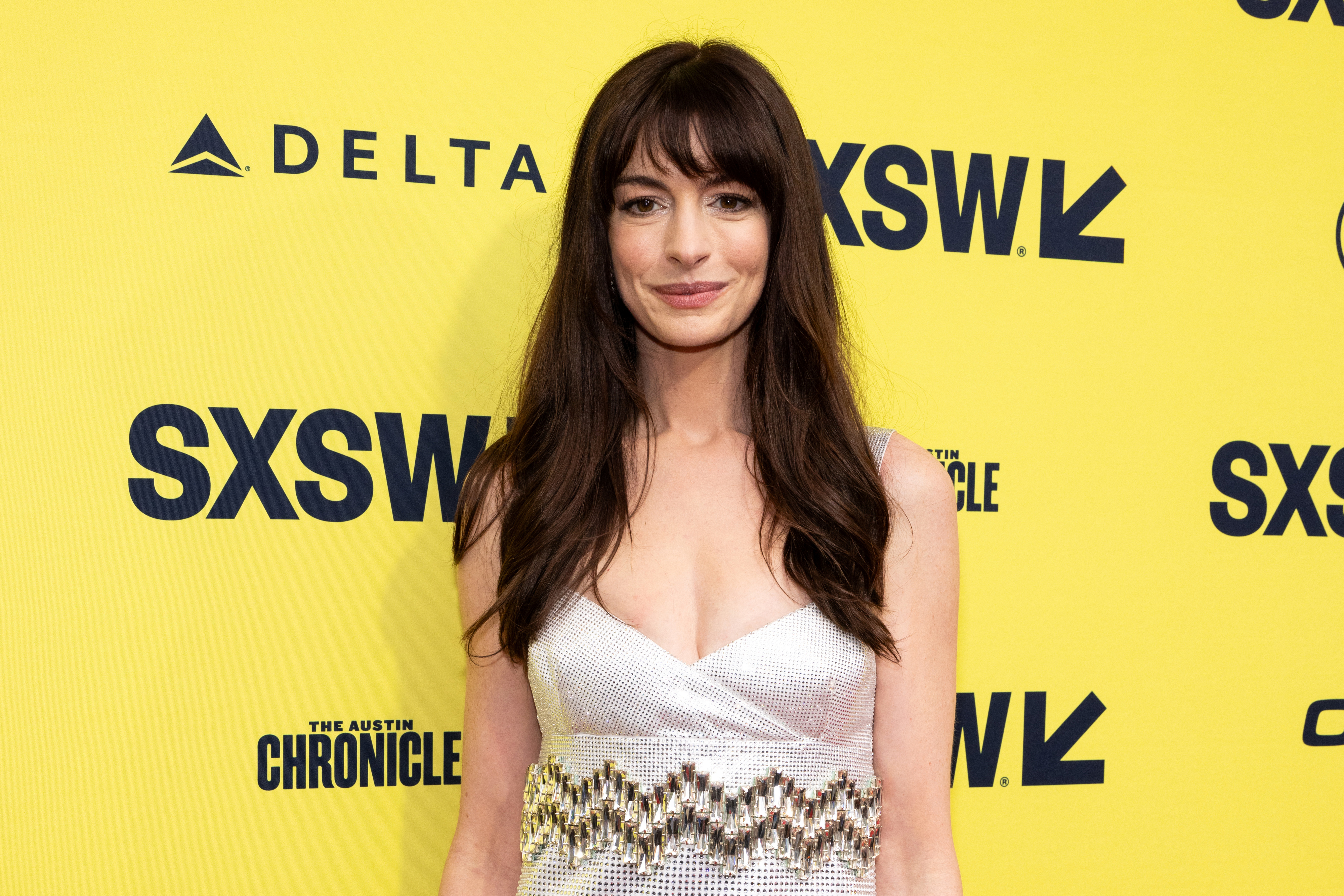 Anne Hathaway in a sleeveless v-neck dress at SXSW event
