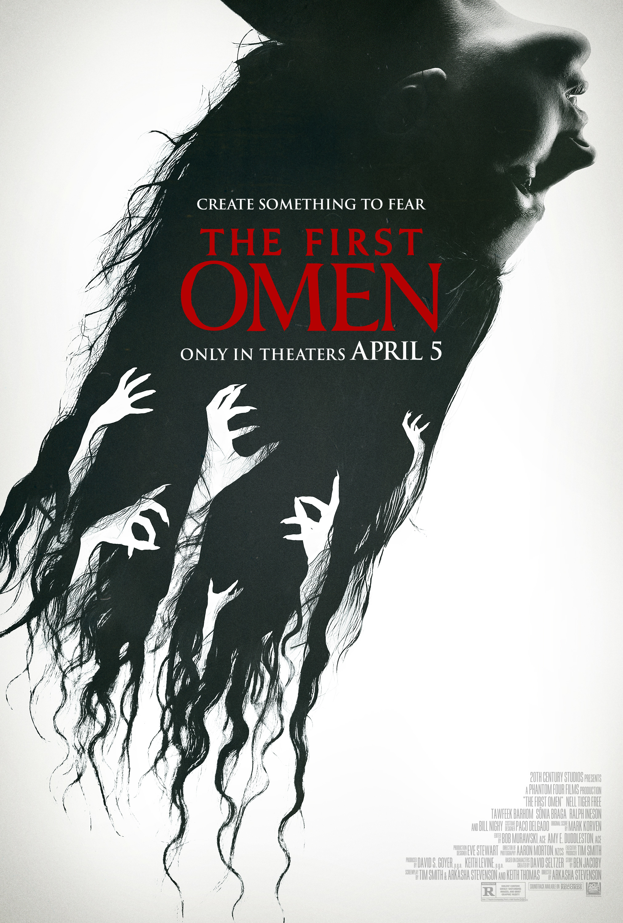 Promotional poster for &quot;The First Omen&quot; featuring a silhouetted profile with eerie hands reaching upwards. In theaters April 5