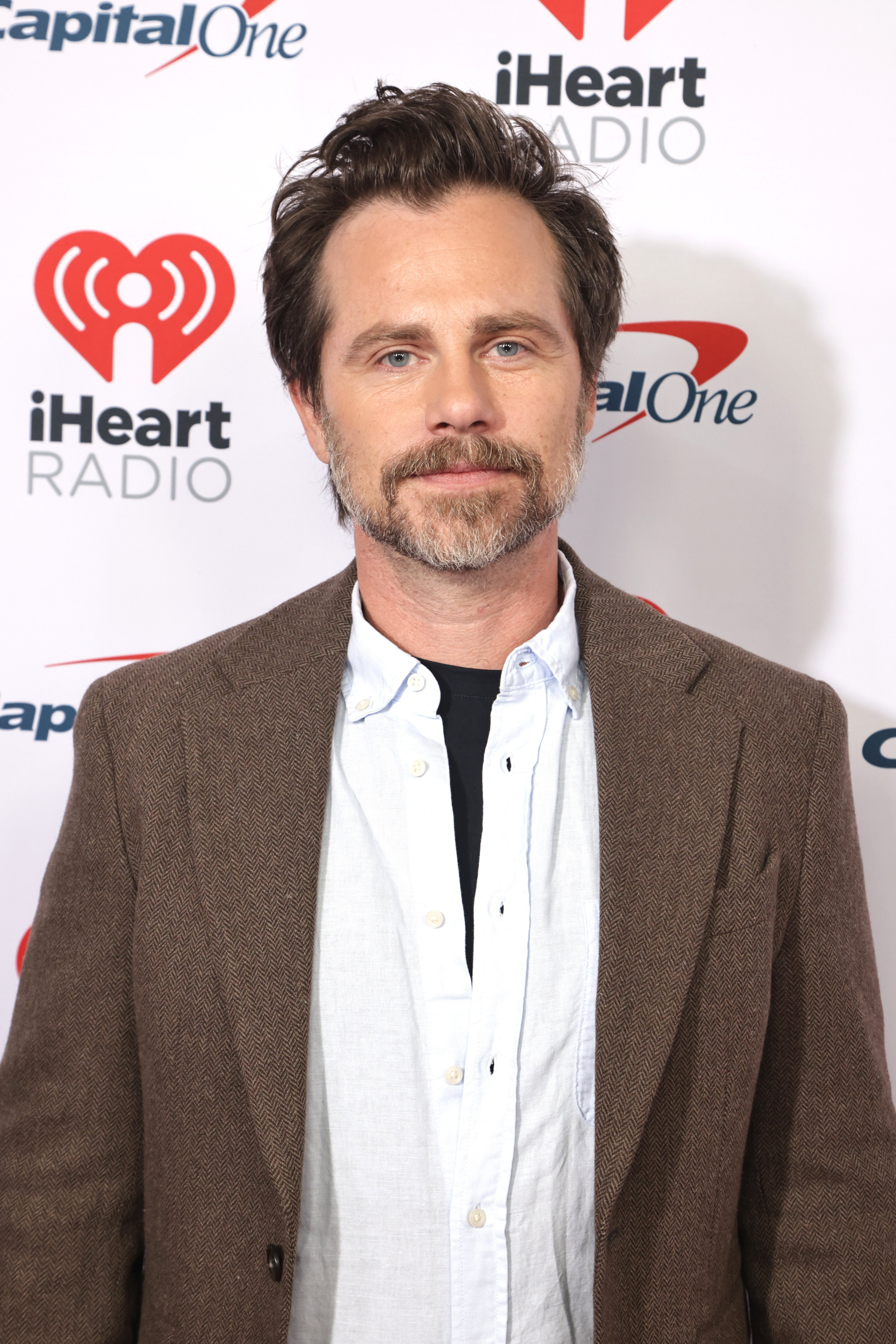 Closeup of an adult Rider Strong on the red carpet
