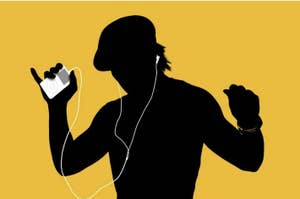 Silhouette of a person with headphones holding a camera against a yellow background