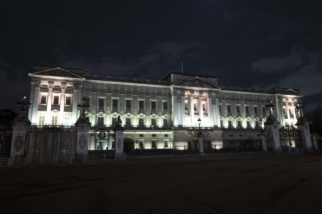 Night view of Buckingham Palace illuminated with no visible people