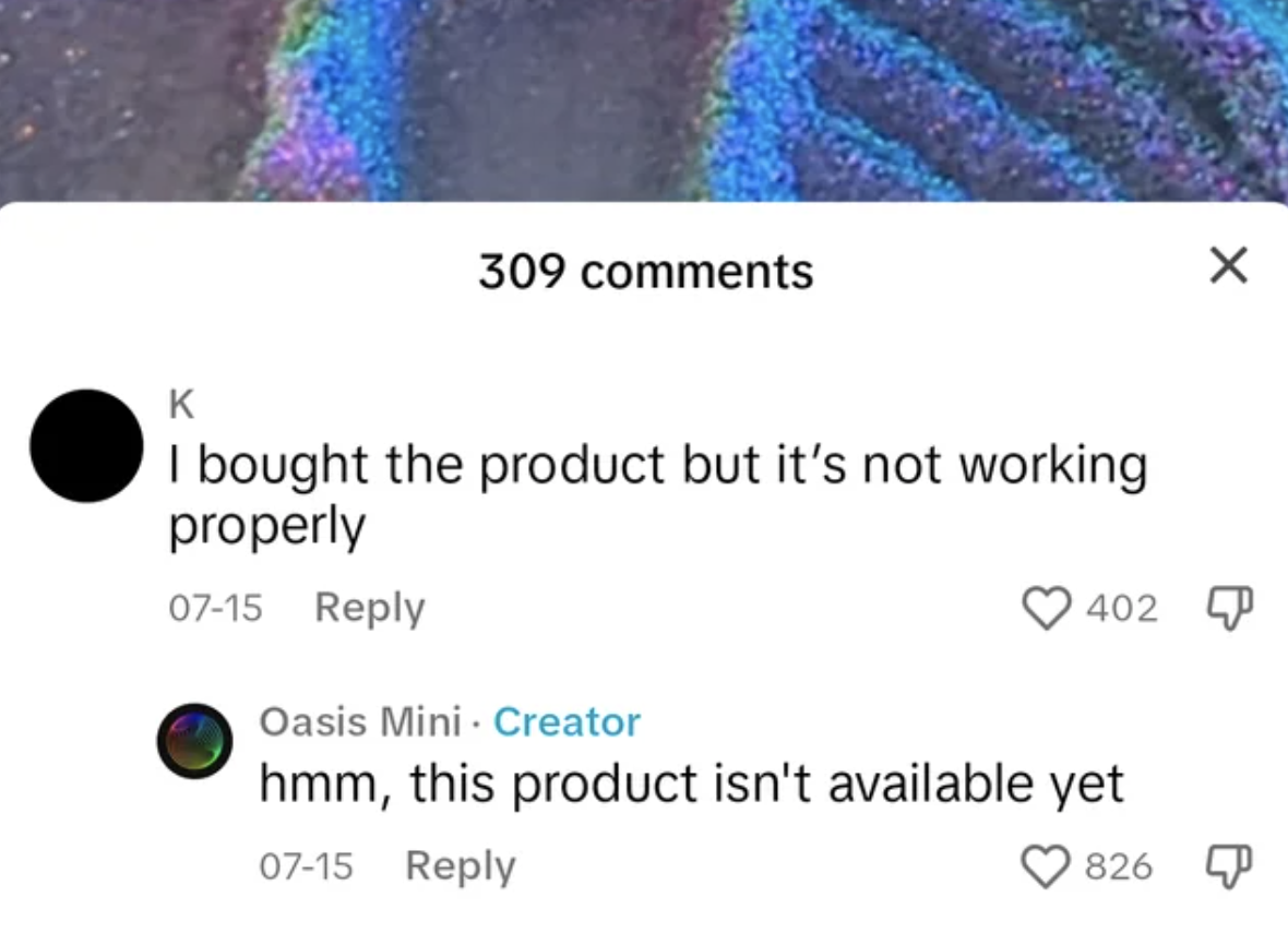 Screenshot of a social media interaction where a user complains about a product not working and the creator responds, stating the product isn&#x27;t available yet
