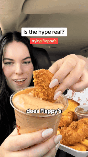 Person dipping chicken nugget into sauce with text &quot;Is the hype real? trying Flappy&#x27;s&quot; and &quot;does Flappy&#x27;s&quot;