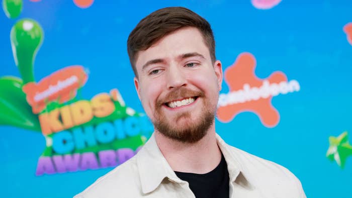 Man in a casual jacket smiling at the Nickelodeon Kids&#x27; Choice Awards