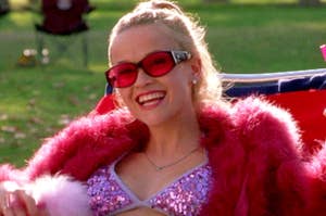 Elle Woods smiling in a sparkly pink bikini and a pink fur coat.