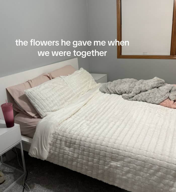 Text on image over a bedroom scene reads &quot;the flowers he gave me when we were together.&quot;