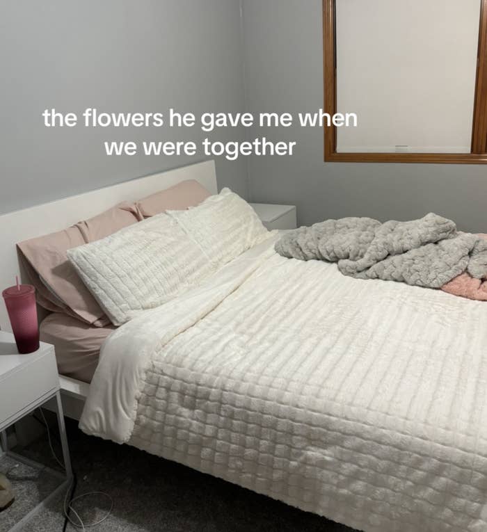 Text on image over a bedroom scene reads "the flowers he gave me when we were together."