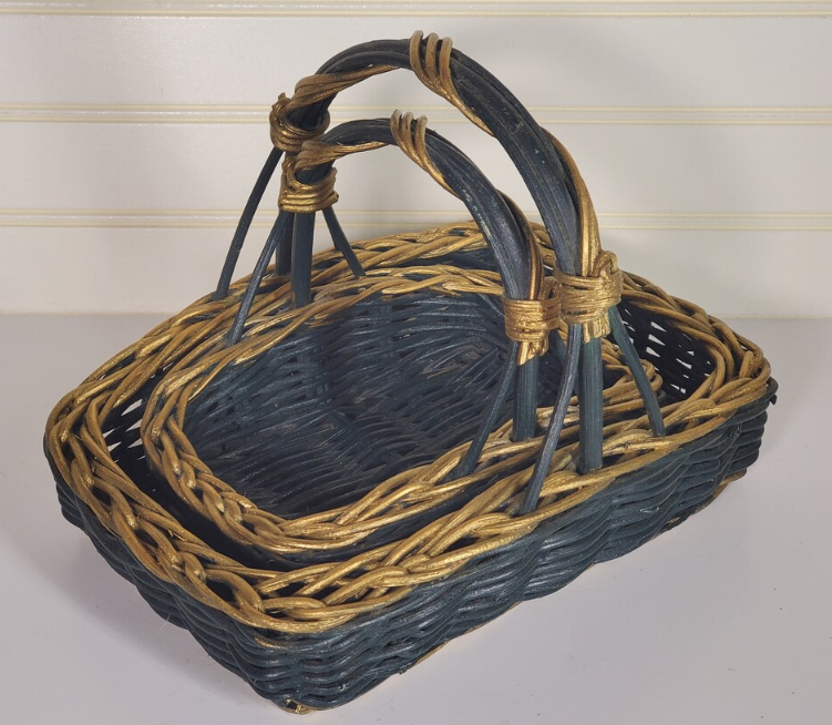Oval wicker basket with intertwined handle displayed on a flat surface