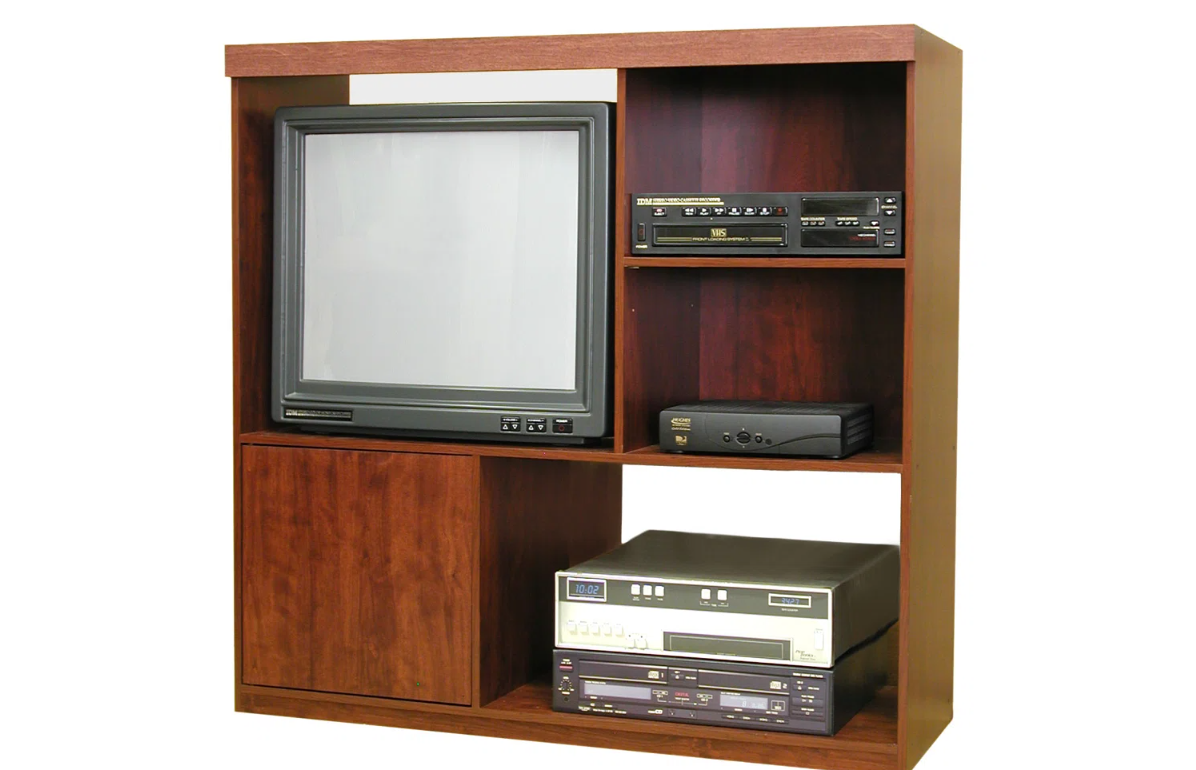 Vintage entertainment center with a boxy CRT television and VCR units