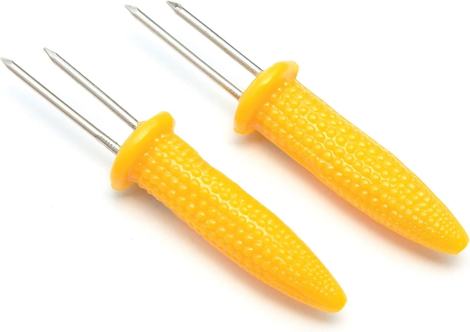 Two yellow plastic corn holders with metal prongs, isolated on a white background