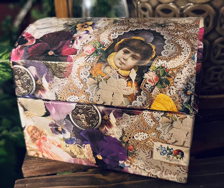 Vintage-style floral patterned box with classic artwork and intricate details