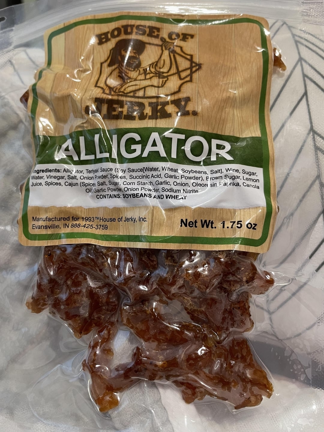 Package of &quot;HOUSE OF JERKY&quot; Alligator Jerky, 1.75 oz with ingredients and company contact info
