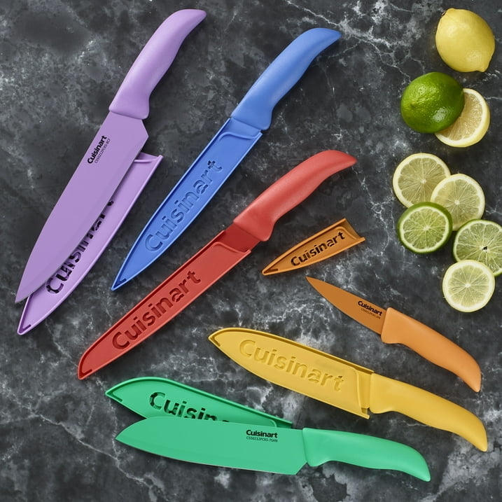 A set of Cuisinart kitchen knives with protective covers, arranged around cut citrus fruits