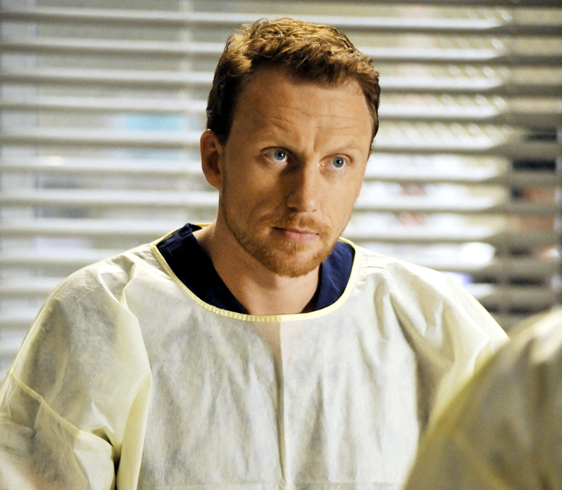 Owen Hunt from Grey&#x27;s Anatomy in scrubs, looking concerned in a hospital setting