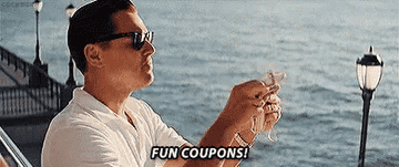 Leonardo DiCaprio as Jordan Belfort in &quot;The Wolf of Wall Street&quot; tossing money off a yacht