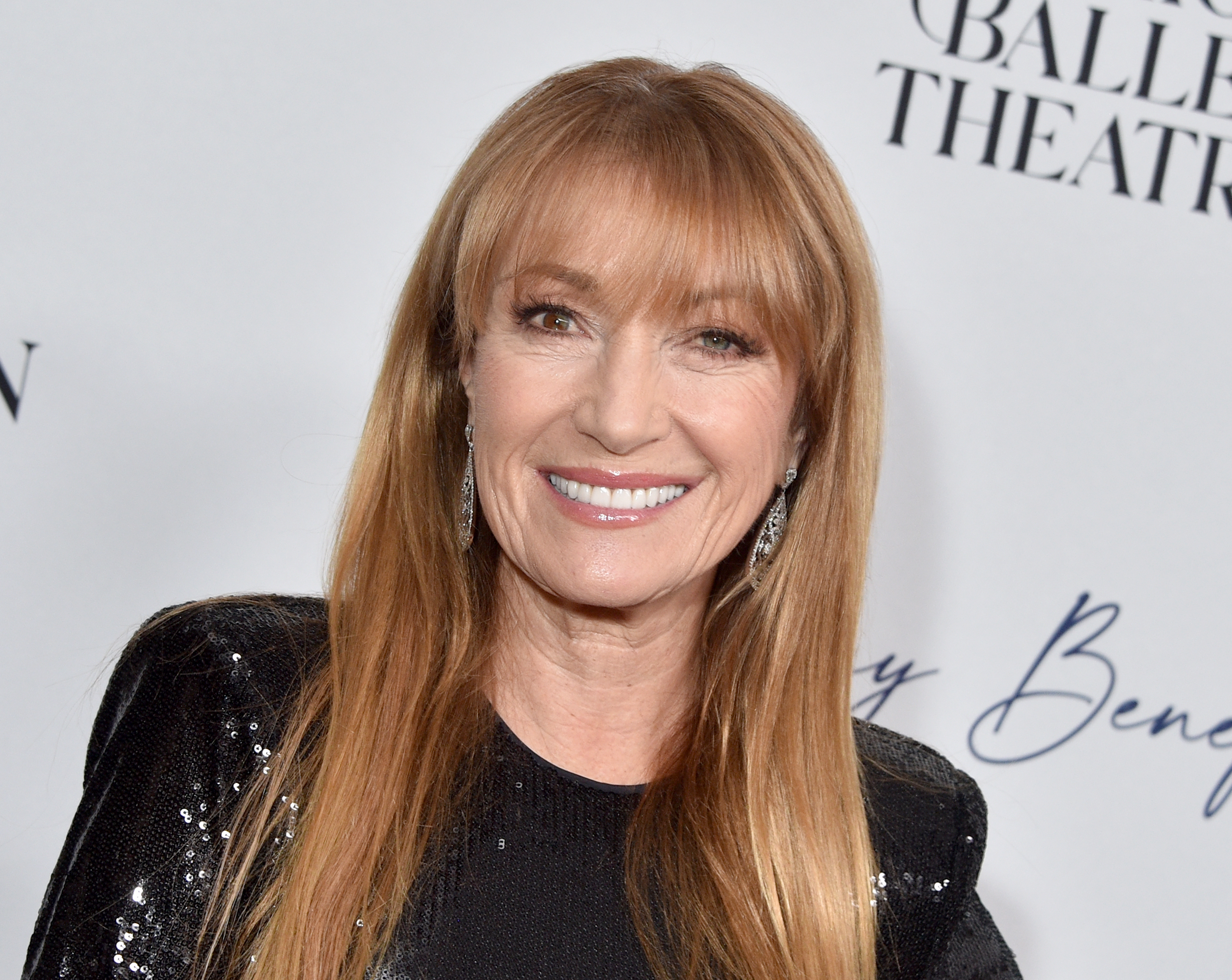 Jane Seymour smiling in a black sequined top at an event