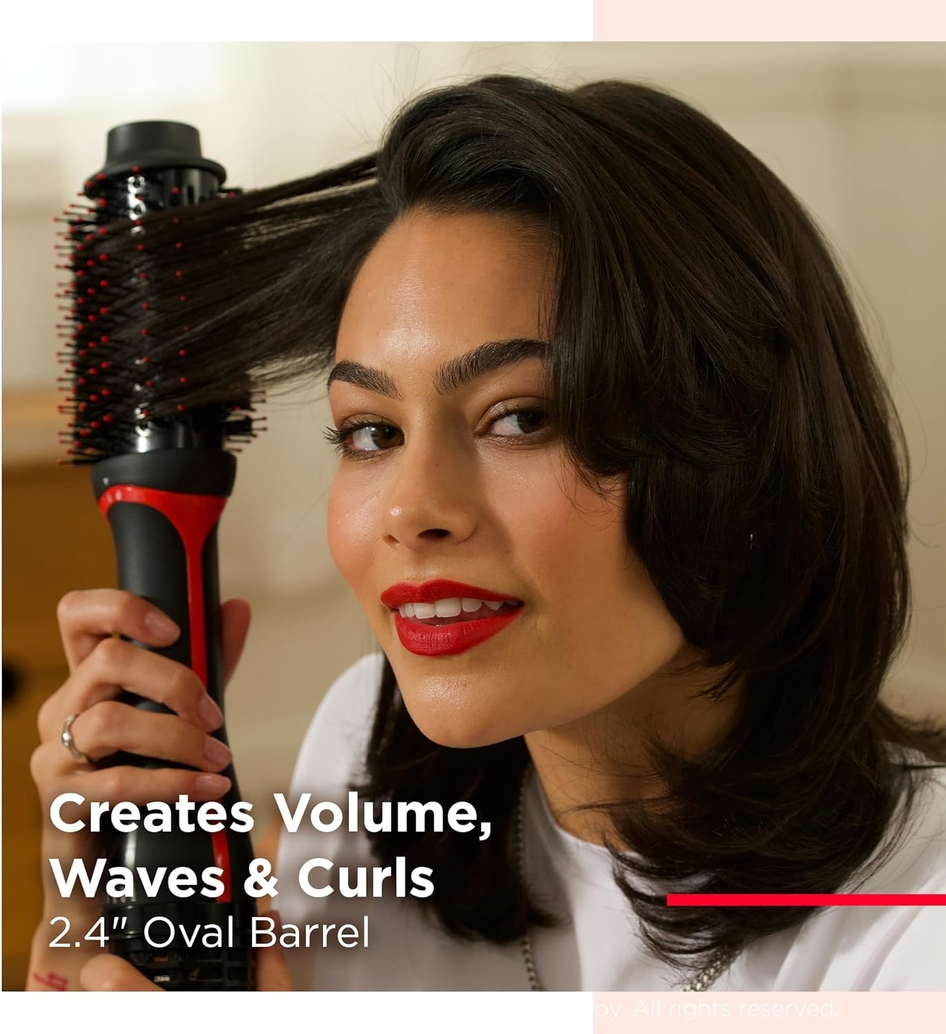 A person using a 2.4&quot; oval barrel brush to style hair with volume, waves, and curls. Text highlights the product&#x27;s features