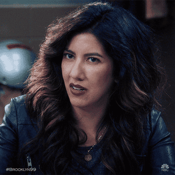 Rosa Diaz from Brooklyn Nine-Nine is shown with a puzzled expression