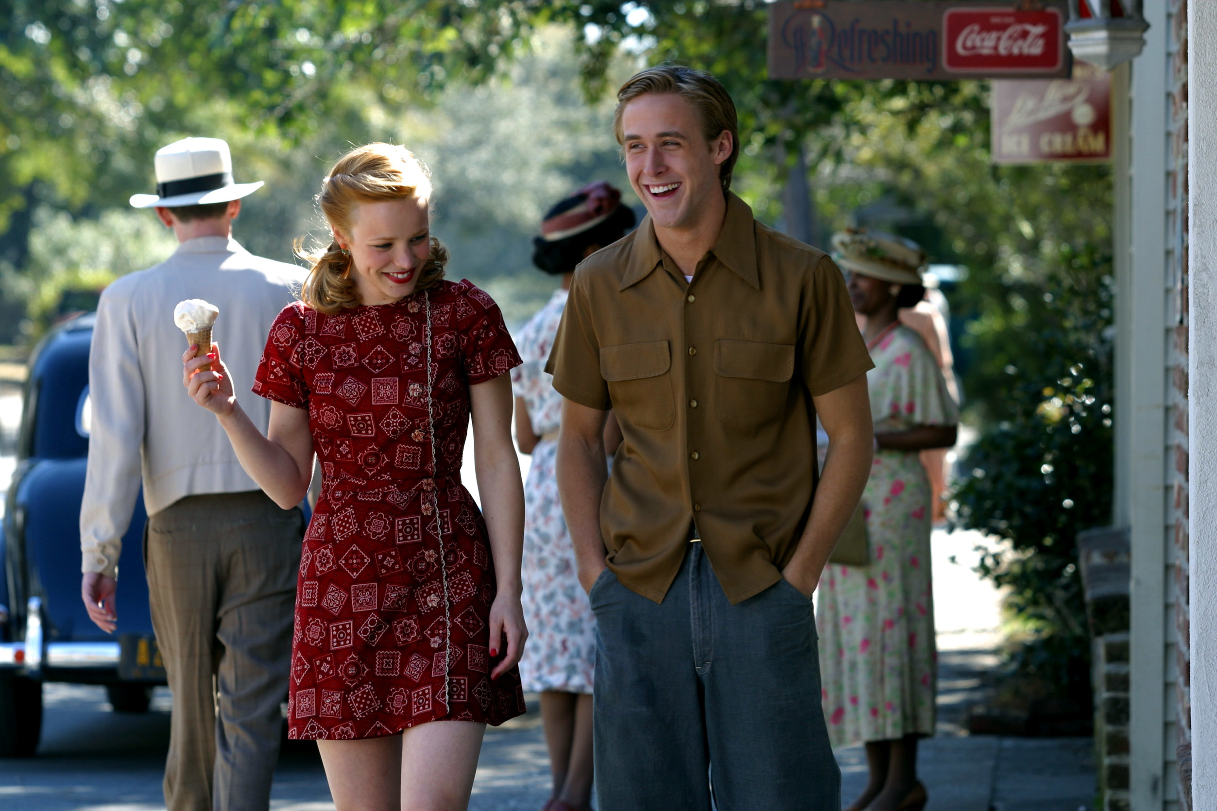 Noah and Allie walking and smiling with an ice cream cone