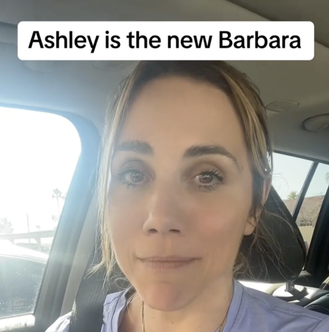 Woman in a vehicle with text saying &quot;Ashley is the new Barbara.&quot;
