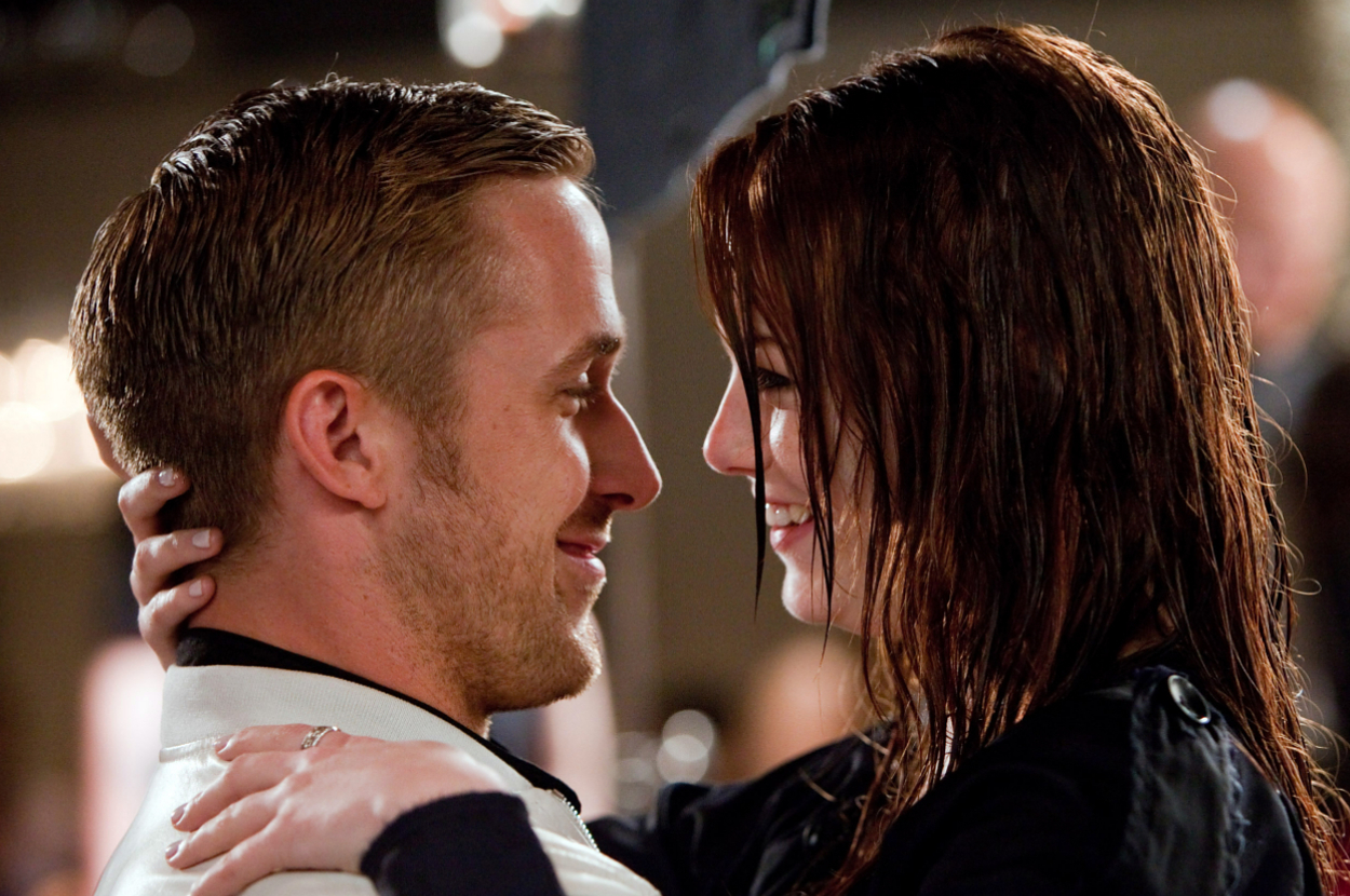 Ryan Gosling and Emma Stone smiling at each other as Jacob and Hannah in Crazy, Stupid, Love