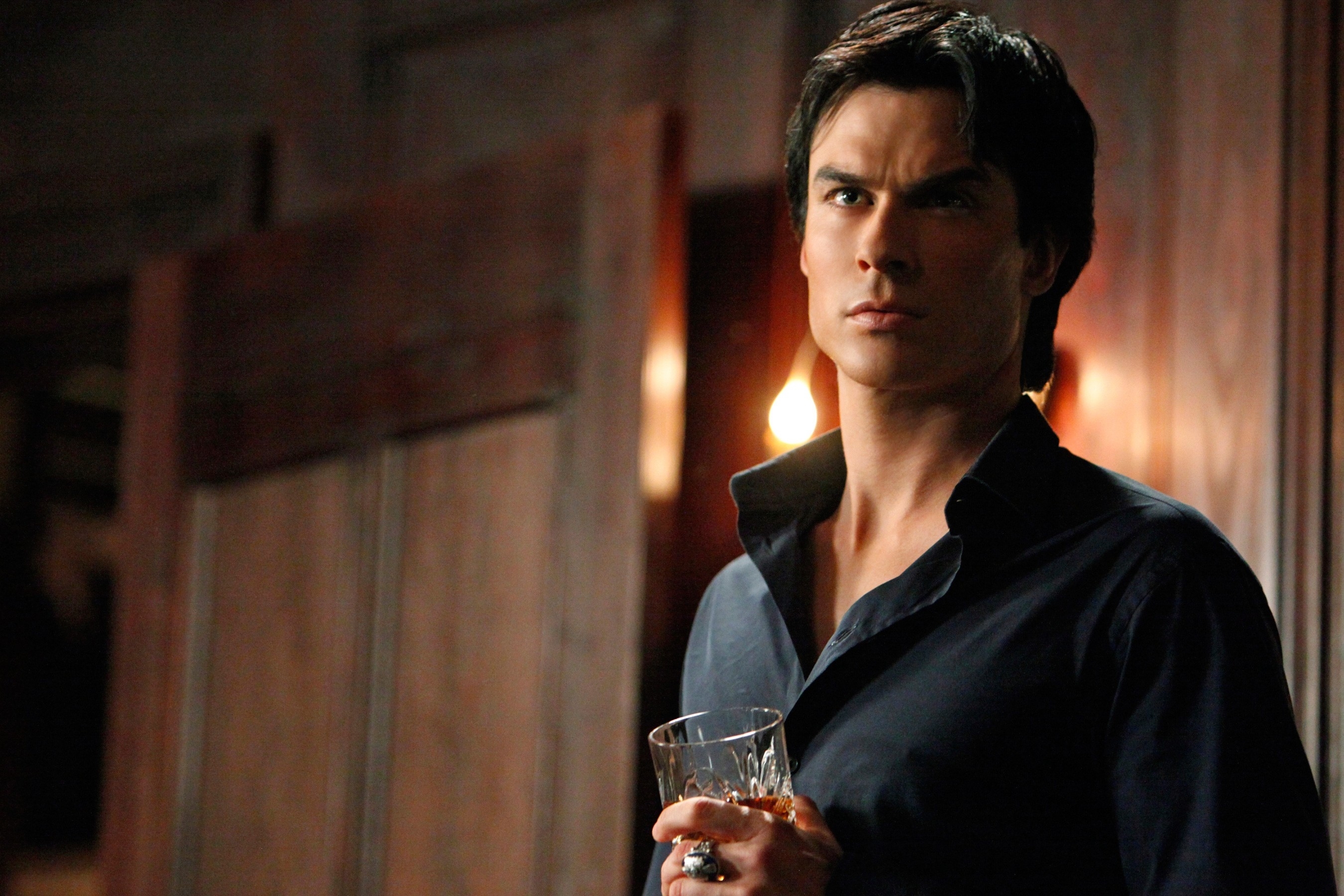 Ian Somerhalder in character as Damon Salvatore from &quot;The Vampire Diaries,&quot; holding a glass