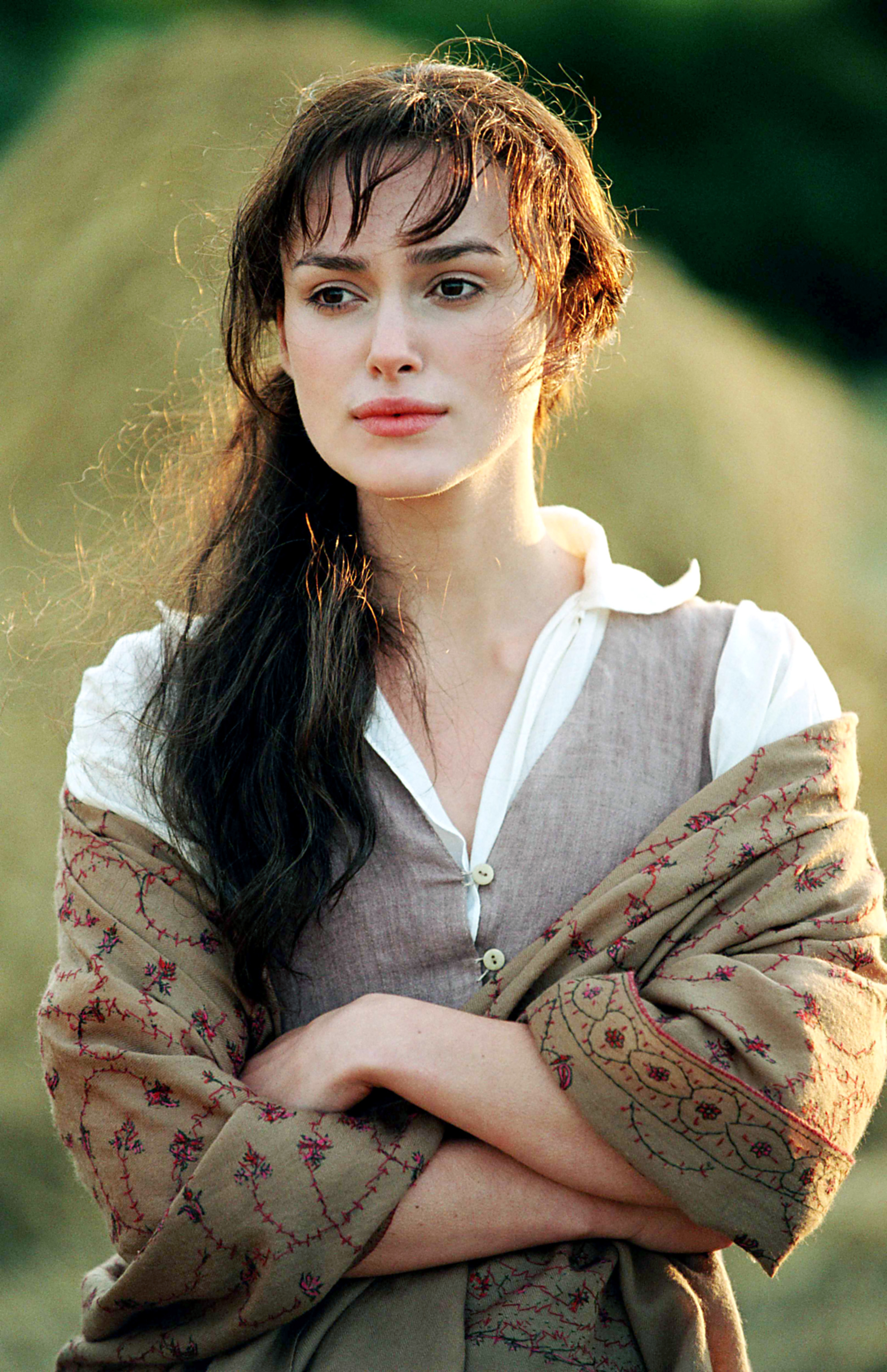Elizabeth Bennet from Pride and Prejudice in a historical dress, looking thoughtful