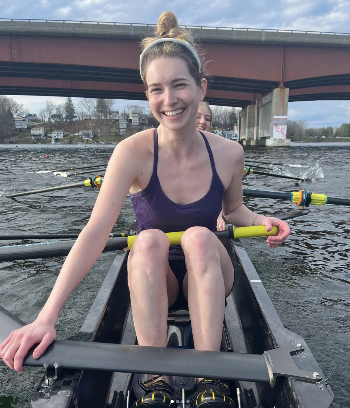 Caroline Cray Quinn rowing on a boat