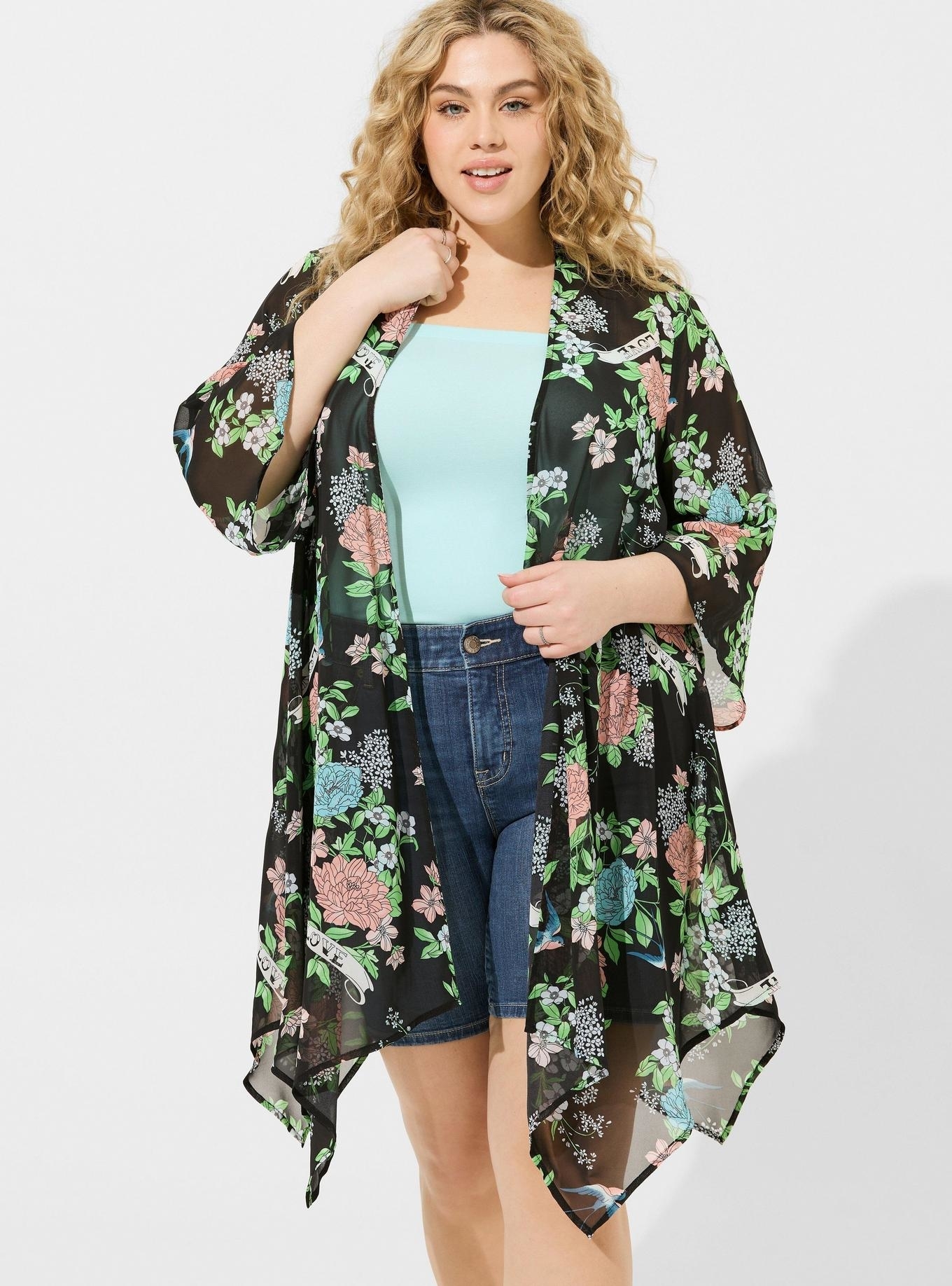 Model wearing the floral cardigan