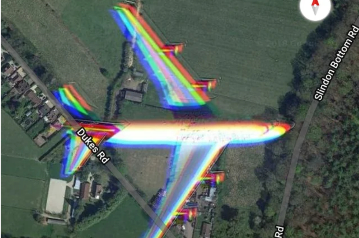 Satellite view of a plane with rainbow color artifacts on Google Maps