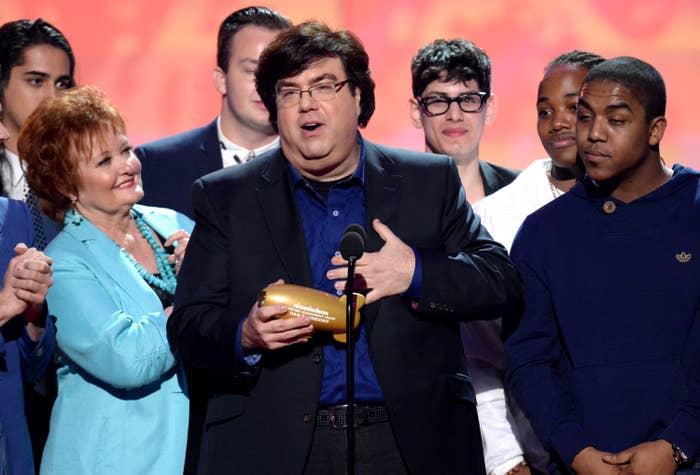 Nickelodeon show runner Dan Schneider receiving an award in 2014