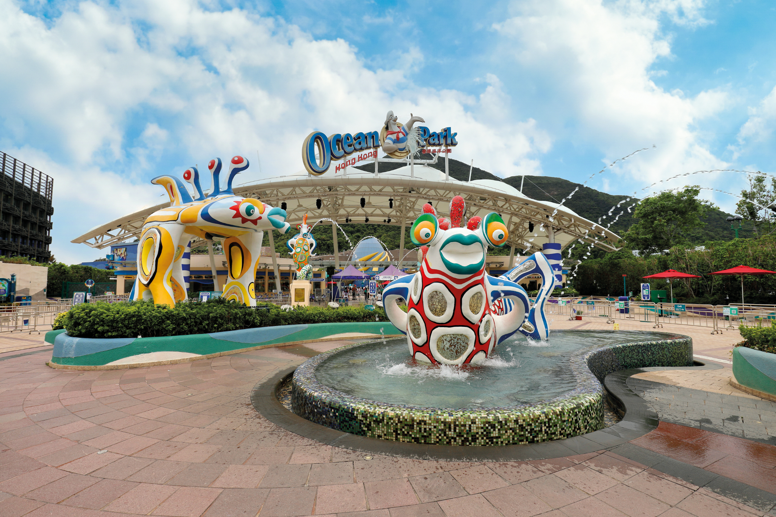 Entrance of Ocean Park with a whimsical archway and animal statue fountain