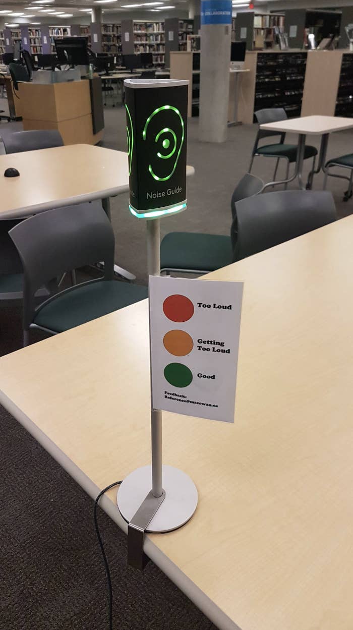 Noise level indicator with green light on top and explanatory sign with &quot;Too Loud,&quot; &quot;Getting Loud,&quot; and &quot;Good&quot; levels