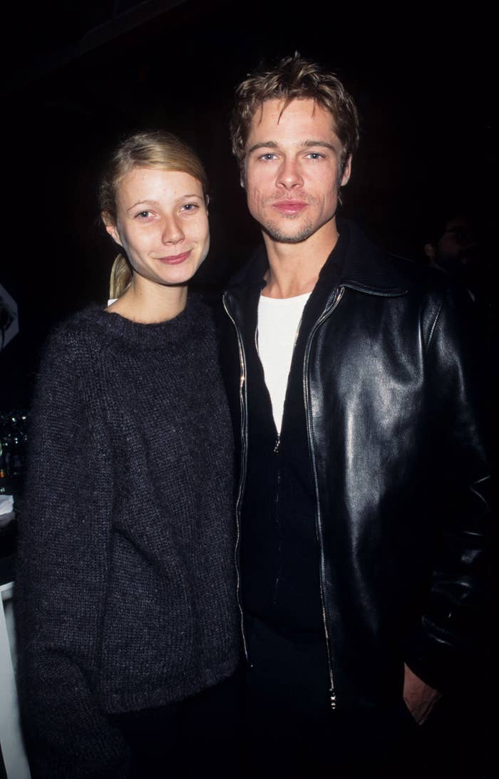 Gwyneth is wearing a relaxed sweater, and Brad sports a leather jacket