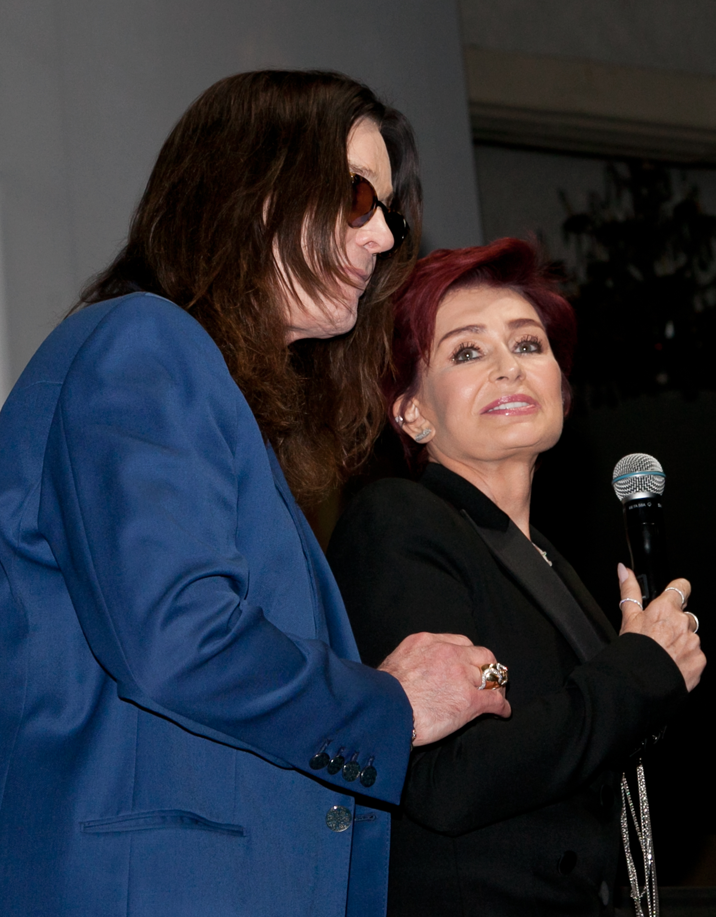 Ozzy Osbourne and Sharon Osbourne standing together