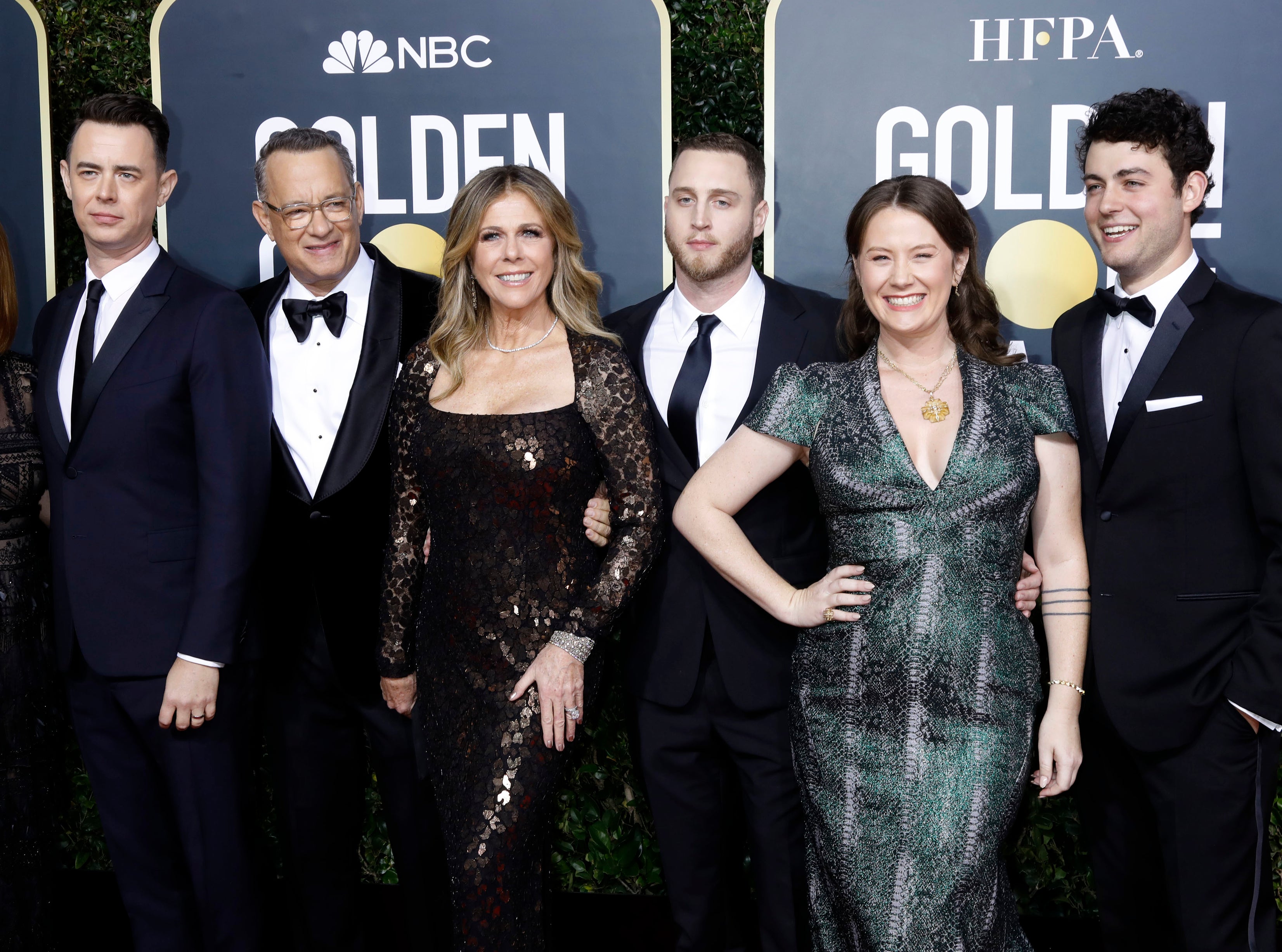 the Hanks family posing together on the red carpet at the Golden Globes