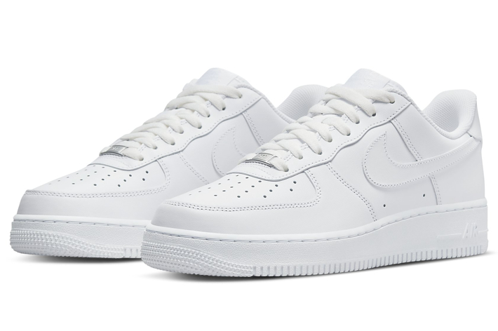 A pair of Nike Air Force 1 sneakers on a plain background