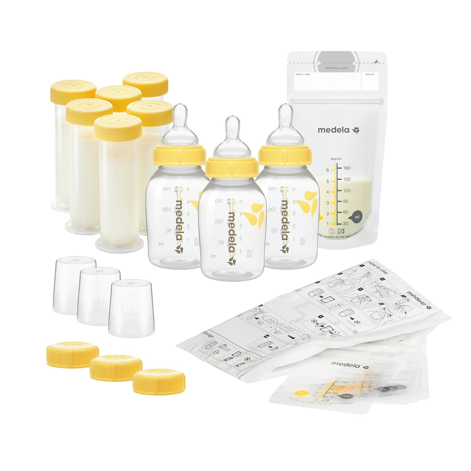 Medela breast milk storage solution set with bottles, labeling lids, bags, and tray for feeding and storing milk