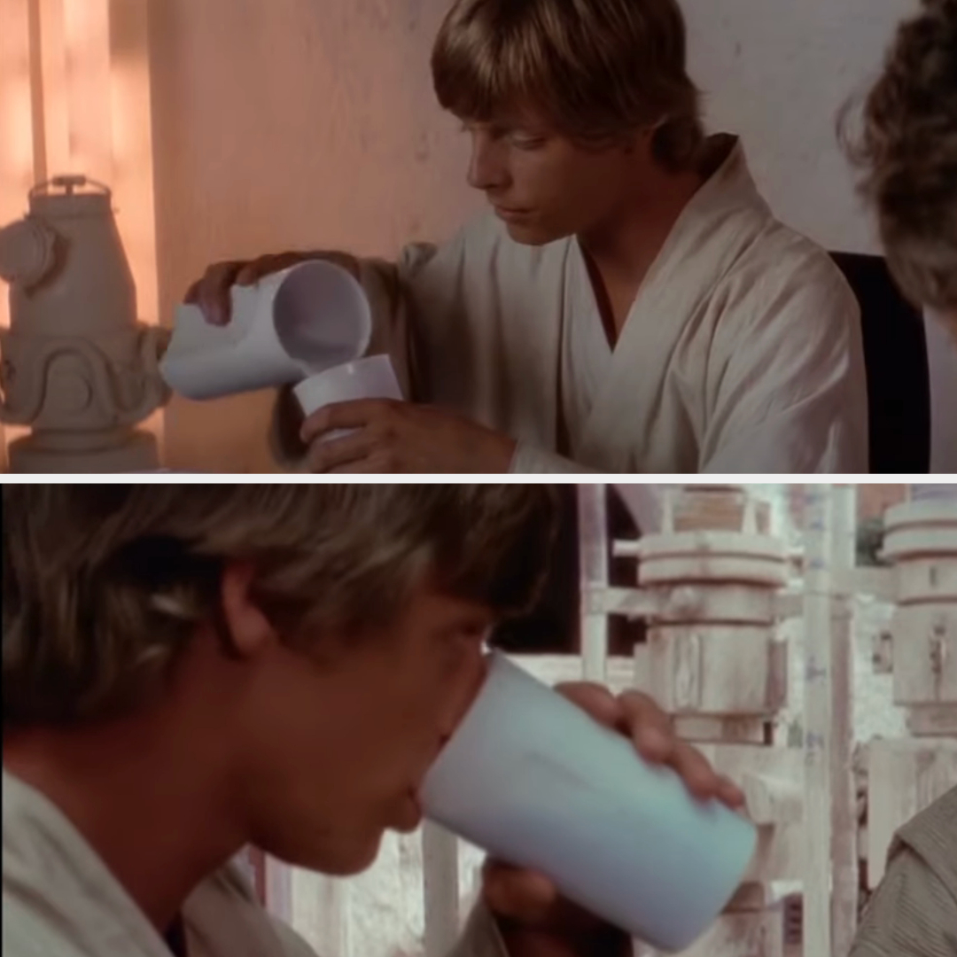 Luke Skywalker in a scene from Star Wars, holding a beverage container