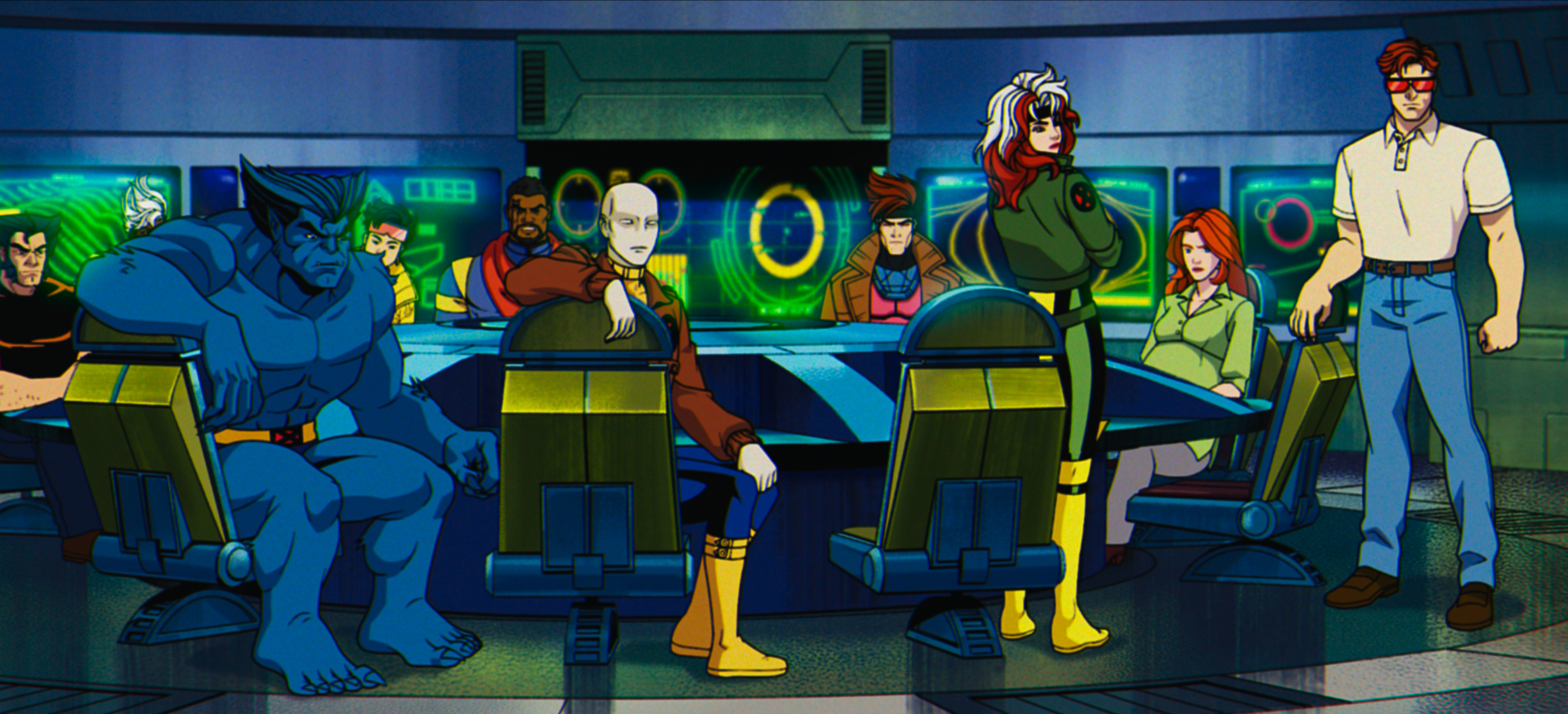 Animated characters from X-Men sitting and standing in a high-tech command center