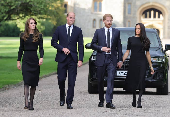 Prince William and Kate walking with Prince Harry and Meghan