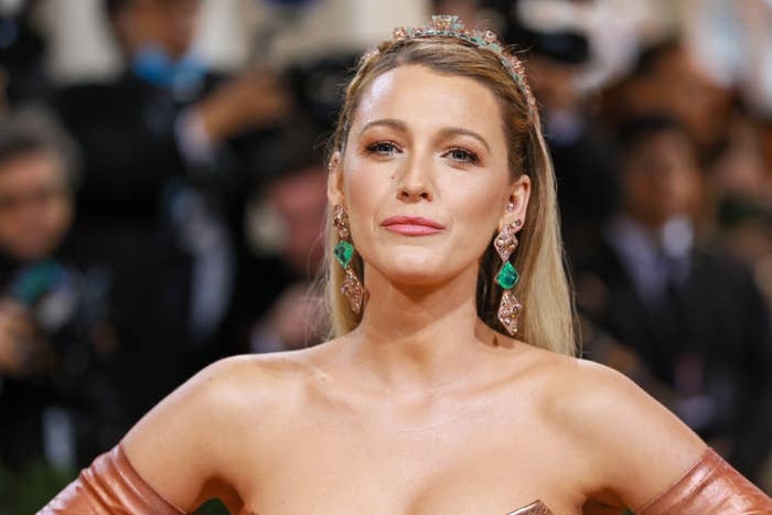 Blake with jeweled headband and off-shoulder gown at event