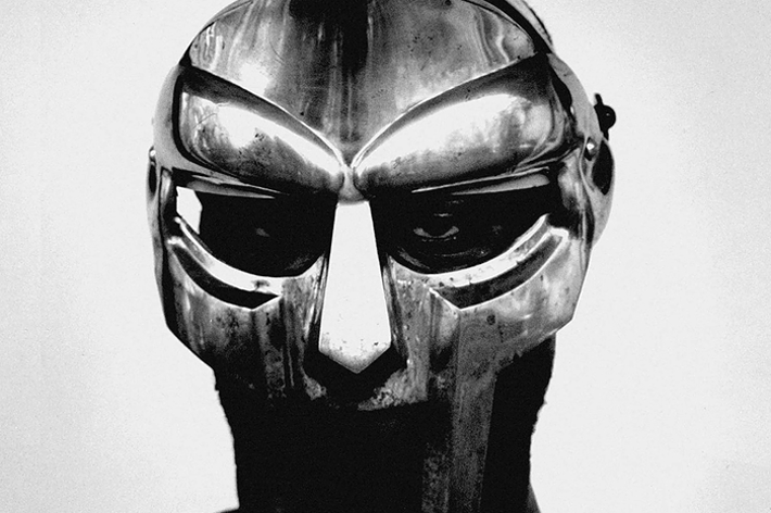 Album cover featuring an individual with a metallic mask resembling a gladiator, for the music group Madvillain